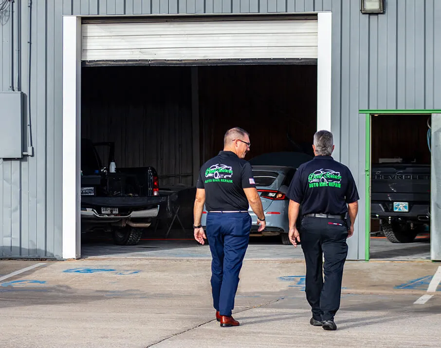 Team walking toward garage