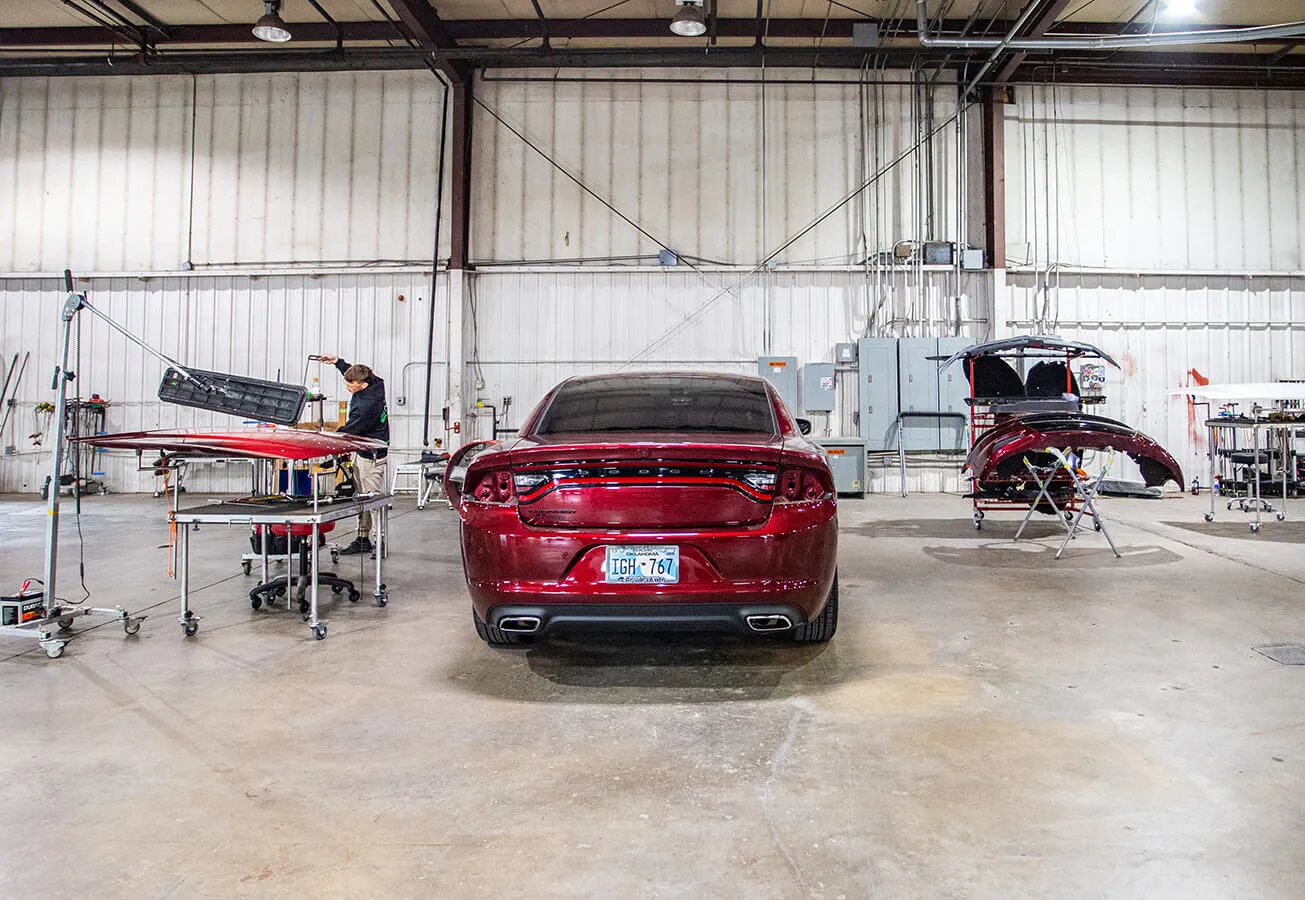 Staff repairing vehicle