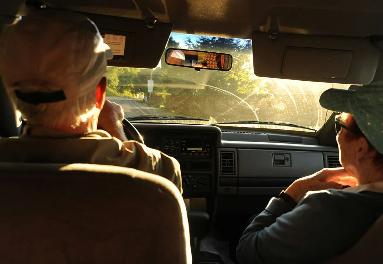 Older couple driving